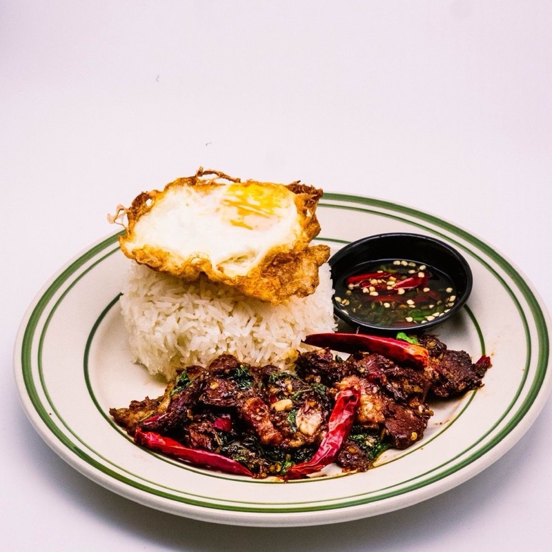 Pad Kaprao beef with a crispy fried egg over rice